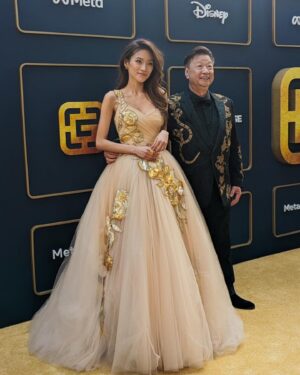 Vanessa Yao Instagram - Entering Hollywood’s Red Carpet tonight with a bam 💥 for the A100 Gold Gala celebrating Asians. Thank you to @DolceGabbana for custom designing this beautiful dream gown for me. Words truly cannot describe this work of art.

@tzima8 Thank you for being the best arm candy!

You’re the best @luciodirosa 

Photographers: @little.gaia @kt_yau 
Makeup: @jenichua 
Hair: @heatherlurk 
Styling: @sarahdarceystyle 

@goldhouseco #goldhouse #goldgala #A100#dolce #dg #dolcegabbana