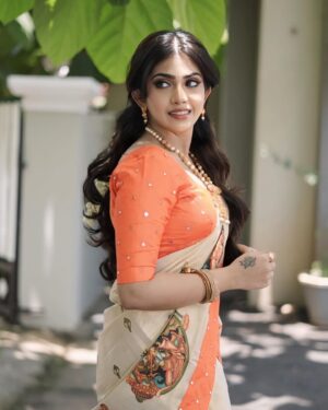 Varsha Viswanath Instagram - 🧡

📸- @_prasanth_sivadas_ 
Hair - @makeup_by_sabana_ 
.
.
.
.
. 
#happyvishu #photooftheday #festivegreetings