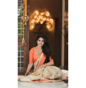 Varsha Viswanath Instagram - Happy Vishu 🧡

📸- @_prasanth_sivadas_ 
Hair - @makeup_by_sabana_ 

.
.
.
.
.
#happyvishu