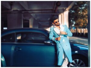 Varun Kamal Instagram - "Dressed in blue, vibes so true. Standing by my ride, as 'So Sweet' takes you on a musical ride. 🎶 Check out my latest song on all audio platforms and YouTube. Let the melody match the color – cool and electric. #SoSweet #MusicMagic #BlueVibes"