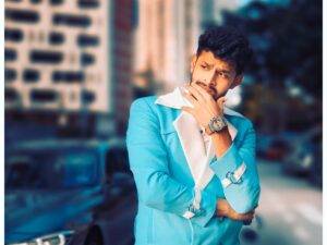 Varun Kamal Instagram - "Dressed in blue, vibes so true. Standing by my ride, as 'So Sweet' takes you on a musical ride. 🎶 Check out my latest song on all audio platforms and YouTube. Let the melody match the color – cool and electric. #SoSweet #MusicMagic #BlueVibes"