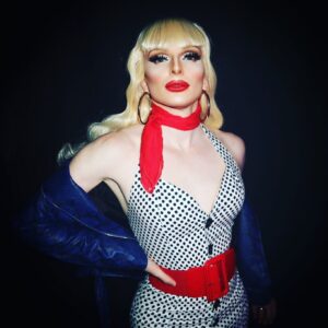 Veronica Green Instagram - Couldn’t resist wearing my favourite look for the finale of the @dragraceukbbc season 2 tour. 

Yes I’ve worn this look before, but being on a budget made me make some tough decisions to reuse & recycle. All of my resources went into my look for my solo set. (Which I will post soon).

Having said that, anytime I get the opportunity to whip this look out, I will. @tracilords is my FAVOURITE ❤️🤍💙

📸 @awhora 
💇🏼‍♀️ @carlbrownhair 
🧥 @asos 
👗 @veronicaqween 

I’d say book a ticket to see the tour but we’re #soldout 

#blonde #crybaby #fringe #badbitch #femmefatale #50’s #rockabilly #redlips #badgirl #dragraceuk #dragraceukbbc #rupaulsdragrace #bbcthree #bbciplayer #bbc #leatherjacket #rock #rockandroll #femme #gay #gayboy #dragqueen #drag #lgbt #redwhiteandblue
