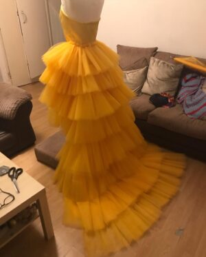 Veronica Green Instagram - Red Carpet Showstopper.

This look, in part was to pay homage to my mum and her sisters. Being an 80’s baby, I was around this kind of hairstyle A LOT in my family and wanted to celebrate my mum and all my aunties who rocked the perm.

Fran, Anne, Eileen, Cathy, Jeanette & Mary. This runway was for you! Love you 💚💚💚💚💚💚💚💚💚💚💚💚💚💚

#wearefamily

Added background info on the look. creation #Howimadeit

I didn’t cope very well with the lockdown after production shut down on season 2. In May 2020 I tried to keep myself busy with sewing projects to ‘elevate’ my drag for my season 2 return but I had no work, no money and no contacts. I had to keep my drag race journey a secret from everyone and it took a mental toll. Taking the NDA too seriously and not telling my friends, family and housemates put one of the biggest mental strains on me in my life. I felt isolated, helpless and alone.

Im not a designer. I taught myself to sew specifically for drag race using a lot of YouTube tutorials. I saw this cute dress I liked and wanted to recreate it with my own spin on it. Project ‘Ray of sunshine’ as I called it was to try to keep me upbeat during the lockdown, hence the sunshine colour scheme. (I was not aware that a dress similar had been worn on the runway of Drag Race U.S until AFTER I completed the dress but oh well, we live and we learn).

The Ill fitting critique was a valid one. I saved every spare penny I had over the summer and finally bought my own proper mannequin to replace the shoddy, too short and wonky shop window one I had been using so that I could get better at creating my own garments.

#dragisart

📷 @daveytyy 
📸 @retoucher_ryan edit and retouching
💇🏼‍♀️ @emmarigby_pro 
👗 @veronicaqween made by me.

Thanks to everyone who assisted on the shoot day.

@johndawsonphotographer 
@artsmontage 
@pixs78