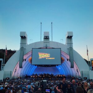Wesley Chan Instagram - ⚡️BACK TO THE FANBOY⚡️

Back to the Future is an okay movie I guess if you like that sorta thing and it was kinda neat seeing it with a live orchestra playing the movie score and stuff 💀💀💀

We sat right behind Bob Gale— the creator of the BTTF trilogy and Mayor Goldie Wilson himself, played by actor Donald Fullilove— for the entire movie!

Met the one and only Alan Silvestri during intermission, who composed all the music for BTTF and so so so many iconic films!

If you can’t tell from my cheesin’ and fanboy containment, the  entire night made smol and grown Wes excited beyond belief. An unforgettable experience with my dearest friends. Thank you so much @ewangus @porterduong @kihonglee @hayochoi @danakadan