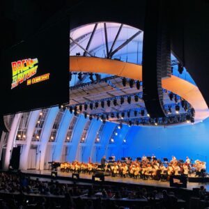 Wesley Chan Instagram - ⚡️BACK TO THE FANBOY⚡️

Back to the Future is an okay movie I guess if you like that sorta thing and it was kinda neat seeing it with a live orchestra playing the movie score and stuff 💀💀💀

We sat right behind Bob Gale— the creator of the BTTF trilogy and Mayor Goldie Wilson himself, played by actor Donald Fullilove— for the entire movie!

Met the one and only Alan Silvestri during intermission, who composed all the music for BTTF and so so so many iconic films!

If you can’t tell from my cheesin’ and fanboy containment, the  entire night made smol and grown Wes excited beyond belief. An unforgettable experience with my dearest friends. Thank you so much @ewangus @porterduong @kihonglee @hayochoi @danakadan