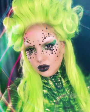 Yvonne MacInnis Instagram - I’ve been wig styling a bit more these days.. getting closer to my final form👽

Makeup Details: 

🧚🏼 @patmcgrathreal foundation 
🧚🏼 @kevynaucoin contour & Highlight palette
🧚🏼 @yslbeauty concealer 
🧚🏼 @kevynaucoin loose setting powder
🧚🏼 @kimchichicbeauty white concealer
🧚🏼 @anastasiabeverlyhills X @alyssaedwards_1 eyeshadow palette 
🧚🏼 @thecreativemakeup duochrome color shifting pigment
🧚🏼 @nyxcosmetics matte liquid liner
🧚🏼 @itcosmetics mascara 
🧚🏼 @thecreativemakeup 12 cream color palette 
🧚🏼 @thecreativemakeup 12 cream color palette & Neon Paint   line kit in UV GREEN
🧚🏼 @francisstarcosmetics brushes 
🧚🏼 @danessa_myricks color fix   twin flames liquid eyeshadow 
🧚🏼 @cozzettebeauty foil shadows 
Body suit @candy_catz_wear 💚👽⚡️

#makeupartist #stylist #creative #drag #wigs #wigstyling #neonmakeup #uvmakeup