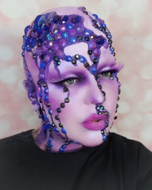 Yvonne MacInnis Instagram - 🔮☔️ PURPLE REIGN ☔️🔮

Giving the children what they want in this 1 hour quick paint challenge!! Damn I was freaking out on the inside but did my best not to let em see me sweat!! 

Join me on ig next week at 7pm EST for a LIVE virtual viewing party 🎉  for the season finale of @paintedwithraven and a MAJOR ANNOUNCEMENT!!! 😈☔️🔮

@worldofwonder @wowpresentsplus @rupaulsdragcon @paintedwithraven 
#makeupartist #makeupcompetition #makeupartists_worldwide #creativemakeup #creativemakeupartist #makeuplooks #purplemakeup #avantgardemakeup