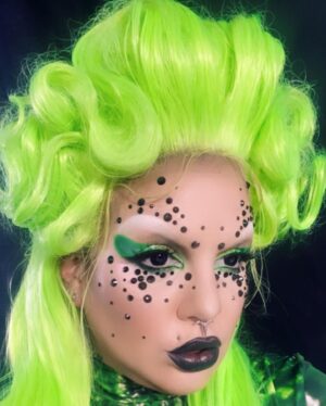 Yvonne MacInnis Instagram - I’ve been wig styling a bit more these days.. getting closer to my final form👽

Makeup Details: 

🧚🏼 @patmcgrathreal foundation 
🧚🏼 @kevynaucoin contour & Highlight palette
🧚🏼 @yslbeauty concealer 
🧚🏼 @kevynaucoin loose setting powder
🧚🏼 @kimchichicbeauty white concealer
🧚🏼 @anastasiabeverlyhills X @alyssaedwards_1 eyeshadow palette 
🧚🏼 @thecreativemakeup duochrome color shifting pigment
🧚🏼 @nyxcosmetics matte liquid liner
🧚🏼 @itcosmetics mascara 
🧚🏼 @thecreativemakeup 12 cream color palette 
🧚🏼 @thecreativemakeup 12 cream color palette & Neon Paint   line kit in UV GREEN
🧚🏼 @francisstarcosmetics brushes 
🧚🏼 @danessa_myricks color fix   twin flames liquid eyeshadow 
🧚🏼 @cozzettebeauty foil shadows 
Body suit @candy_catz_wear 💚👽⚡️

#makeupartist #stylist #creative #drag #wigs #wigstyling #neonmakeup #uvmakeup