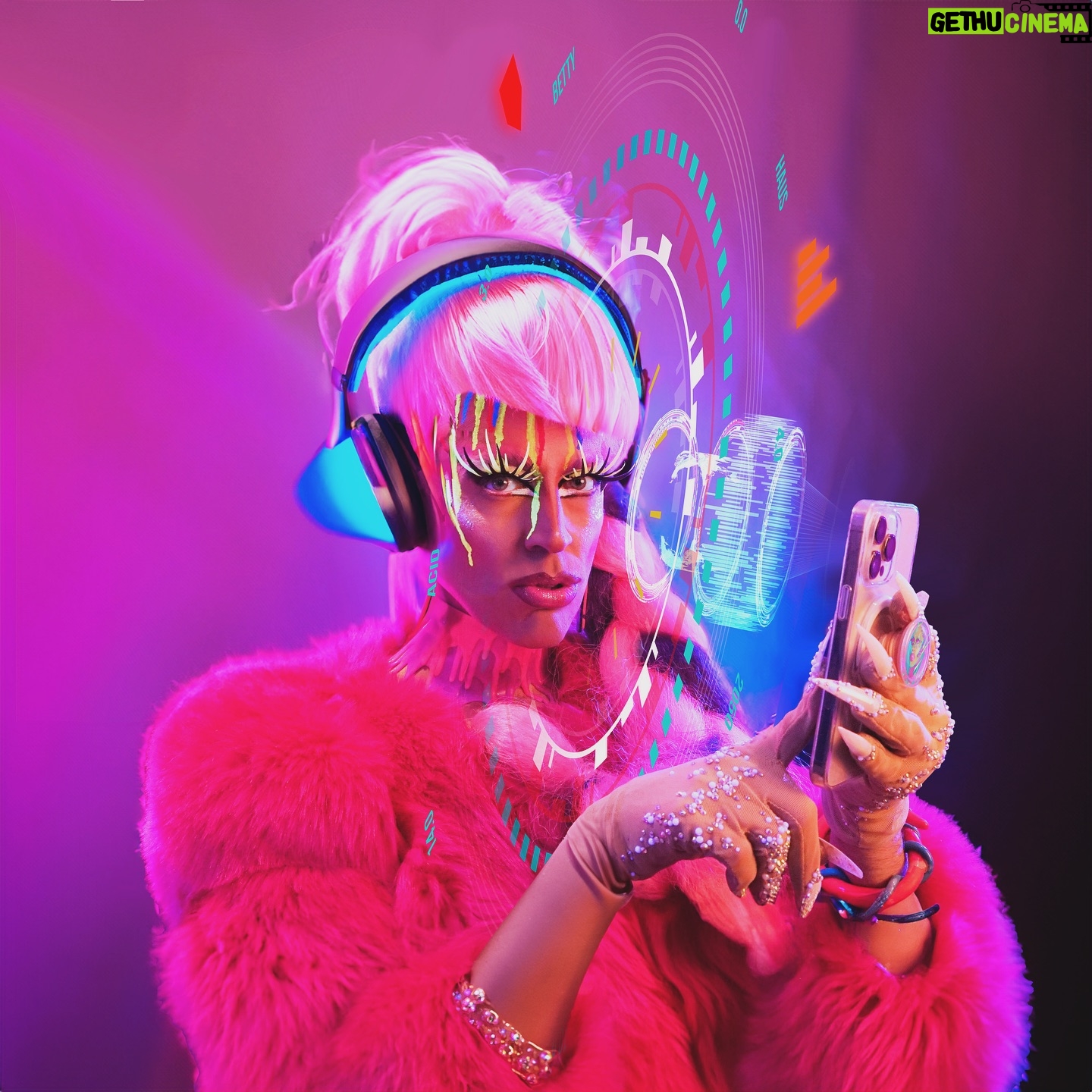 Acid Betty - 1.1K Likes - ⚡️Does this phone take me to the year of @barbie ‘cause this year ain’t werkin’!💥
•
@unicornskincosmetics VIVID Soaking Spectrums drips, Paper lashes and liquid liner💦
@vulpinicvestements drip choker
@vie.lette custom Unicorn Nail Gloves 💅🏻