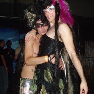 Acid Betty Instagram - I met a guy at every @misssherryvine show who quickly became one of my dearest and best friends. I'll never forget the day I saw his faux hawk, and I thought to myself, 'I want to wear that and dress up with you next week.' That moment marked the beginning of what is now known as Acid Betty (there’s a photo him putting me in his first hawk piece, I was LIVING!).

Marec was not only my personal hairdresser but also my closest friend and the ultimate party companion. He taught me everything I know about hair and is the creator of my signature mohawk and wiglets, as I fondly call them.

Getting older has its challenges, but perhaps the toughest part is losing the friends and companions who have been with us through the years. I used to take photos like crazy before cameras were part of our phones (haha), and I've dug up some early snapshots of us. Those were the days when we'd experiment with hair and makeup and parade around the clubs like a couple of wild fools!

Marec, I miss you more than words can express. You will always be in my heart, and I'll forever cherish the memories we created together. I love you, Acid Sharek!