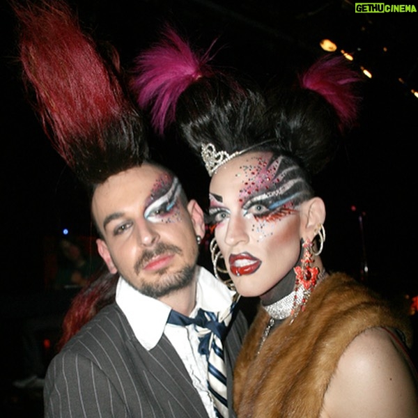 Acid Betty - 5.6K Likes - I met a guy at every @misssherryvine show who quickly became one of my dearest and best friends. I'll never forget the day I saw his faux hawk, and I thought to myself, 'I want to wear that and dress up with you next week.' That moment marked the beginning of what is now known as Acid Betty (there’s a photo him putting me in his first hawk piece, I was LIVING!).
Marec was not only my personal hairdresser but also my closest friend and the ultimate party companion. He taught me everything I know about hair and is the creator of my signature mohawk and wiglets, as I fondly call them.
Getting older has its challenges, but perhaps the toughest part is losing the friends and companions who have been with us through the years. I used to take photos like crazy before cameras were part of our phones (haha), and I've dug up some early snapshots of us. Those were the days when we'd experiment with hair and makeup and parade around the clubs like a couple of wild fools!
Marec, I miss you more than words can express. You will always be in my heart, and I'll forever cherish the memories we created together. I love you, Acid Sharek!