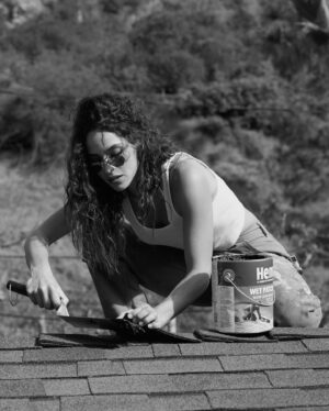 Adria Arjona Instagram - @gregwilliamsphotography and I have shot throughout the years but it’s always been in beautiful gowns that aren’t mine and a face full of makeup. 

This time we did things a little differently. He captured me as authentically as possible in my own home doing things I love to do - fixing shit and getting my hands dirty! Thank you Greg for coming over, for getting on my roof with me, and for coming along a Home Depot shopping spree! @hollywoodauthentic