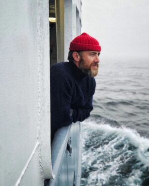 Aldo Kane Instagram - A Life on the Ocean Wave - just spent the last 3 weeks filming  at sea with a top salty crew. 🌊 🎬

Now, family time for the next two weeks, I've a few nappies to change before spinning up for another Jungle mission. 🌳 

Photo @robtaylor.tv

#Expedition #filming #redhat #adventuretv #Commando #ocean #sea #ship