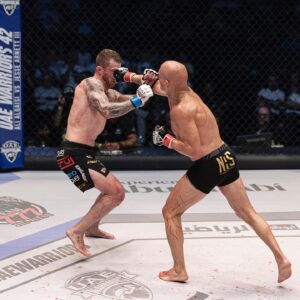 Ali Al-Qaisi Instagram - What a great memory to add to the books! Thank you so much to everyone was a part of this victory 🏆 Especially my wife, kids and family ❤️👨‍👩‍👧‍👦 
Continued thanks to➡️
▪️My Head coach and brother @troythefighterguy 🤝
▪️My brothers @naderqaisi @yaseen_combat and @fightsportsdeerfieldbeach team 
▪️My coaches @gesias & @danielmendes 
▪️My S&C team @ihpfit @jcsantanaihp @benji_vogel 
▪️My nutritional @powernutrition.e2p 
▪️My brothers and partners @ayman.sadieh @nasluxuryad for the best hospitality ever 🙌
▪️My big sponsor and supporter in both the good times and bad times. You’ve always been next to me and pushed me all the way to the top. My big brother @alex_frijat @zioals 
▪️My sponsor @meatmoot.uae 
▪️And last but definitely not least, a HUGE thank you to my @uae_warriors family and team🥷
The Royal Fighter👑
Free Palestine 🇵🇸 
Jordan first 🇯🇴