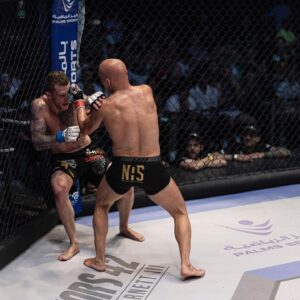 Ali Al-Qaisi Instagram - What a great memory to add to the books! Thank you so much to everyone was a part of this victory 🏆 Especially my wife, kids and family ❤️👨‍👩‍👧‍👦 
Continued thanks to➡️
▪️My Head coach and brother @troythefighterguy 🤝
▪️My brothers @naderqaisi @yaseen_combat and @fightsportsdeerfieldbeach team 
▪️My coaches @gesias & @danielmendes 
▪️My S&C team @ihpfit @jcsantanaihp @benji_vogel 
▪️My nutritional @powernutrition.e2p 
▪️My brothers and partners @ayman.sadieh @nasluxuryad for the best hospitality ever 🙌
▪️My big sponsor and supporter in both the good times and bad times. You’ve always been next to me and pushed me all the way to the top. My big brother @alex_frijat @zioals 
▪️My sponsor @meatmoot.uae 
▪️And last but definitely not least, a HUGE thank you to my @uae_warriors family and team🥷
The Royal Fighter👑
Free Palestine 🇵🇸 
Jordan first 🇯🇴