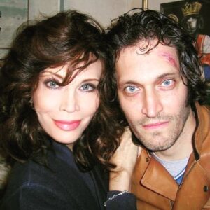 Amanda Lear Instagram - Playing Vincent Gallo ' sister in the italian film Oliviero Rising..black wig and blue lenses ! #cinecitta #roma #vincentgallo #film #