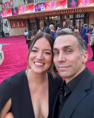 Amos Heller Instagram - I’m in a movie. 

It’s an absolutely wild experience watching all my friends on an IMAX screen. We calculated that at one point my head was 30 feet tall. ( thanks for the slide 1 shot niece extrordinaire @logannbelle)

I’ll admit I was a little surprised at how much I loved watching it.  It’s a completely different experience than being a part of the show, and I was free to just enjoy it. I sang along. I air drummed. I 123’ed. I got to be a fan. 

The premiere was wild. Everyone looked amazing and I barely got enough time to talk to anyone.  You’re never really prepared for an experience like that. It was a buzzing lovely blur of an evening. @karahheller said “I haven’t been tired like this since our wedding” and that really helped me understand it. 

What do you say about @taylorswift ? Trying to stay on our feet in this glitzy maelstrom I thought: she does this all the time. I’m grateful to be given so many challenges and to feel like we are seen and appreciated for the work. The vision, the drive, the SONGS. She’s the only one that doesn’t get a break for 3.5 hours. And she spent all night sharing her spotlight with us. 

There were a lot of folks that worked behind the scenes not only to make sure this movie looked and sounded its best, but also made sure we had the best time at the premiere. It takes a lot of hard work to make this happen, and the folks doing it don’t always get to dress up fancy and take bows at the end. 

Thank you so so much to all the fans. You showed up. Your dressed up. You handed my daughter friendship bracelets. You danced and sang like maniacs in a *movie theater*. You’re the best.