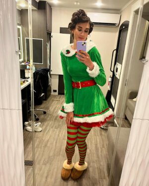 Amy Corbett Instagram - Behind the scenes photodump from @legomastersfox Celeb Holiday Bricktacular 🎄🎅🌟
Have you watched yet? If not, what are you waiting for??? Find it on Hulu 🤩Also…how awesome is all the brick built scenery on set!?! Thought you might like a closer look 🙌
📸 Getting my elf on - comfy slippers and clipped up curls 😂
📸 Brickbuilt fireplace 
📸This teddy bear was a personal fave 
📸Beautifully crafted sleigh 
📸Brickmaster having a blast on set
📸Family photos on the mantelpiece 😂
.
.
.
#legomasters #legomastersfox #legomastersusa #lego #legobuild #holidaybricktacular #celeb #build #play #legobuilders #afol #christmas #christmasspecial #holidayspecial