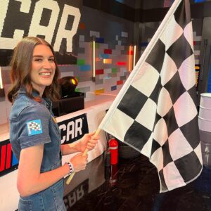 Amy Corbett Instagram - It’s almost the weekend, so let’s go behind the scenes of one of my fave episodes…Nascar! 🏎️🏁🏆
Such a fun one to make. Check out my LEGO Dots patches, designs customised to be totally on theme. And the awesome pit crew that showed us how to change a tyre in record speed!!! I was definitely not a natural, so I’ll leave it to the experts. What a great bunch! 
.
.
.
#legomasters #legomastersfox #legomastersusa #behindthescenes #behindthescenes🎬 #bts #lego #nascar #weekendvibes