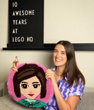 Amy Corbett Instagram - This week, I celebrated 10 years at the LEGO group 😱🍾🤩✨
Woweeeee, what a wild, awesome, magical & truly life-changing time it has been!!!! My wonderful colleagues spoiled me with lots of fabulous gifts, speeches and awesome memories 🎁 💕 🫶
I feel truly lucky to have my dream job doing what I love with the most talented bunch!!! So follow your dreams, and you never know where you might end up… Here’s to the next 10 years being just as fab!!! 🙌🙌🙌
#photodump 
📸2-4 From the fresh faced designer straight out of uni with her first box (of many), to being immortalised as a mini doll - LEGO Friends will always be my first love. 
📸5-6 Creating LEGO DOTS with the team has definitely been one of my career highlights. And we launched with a bang at the House of DOTS by @camillewalala 
📸 7 LEGO Masters has been the biggest adventure - bringing my passion for LEGO & design expertise to the screen with the best bunch. And seeing the awesome creativity of LEGO fans across!!!
📸8-9 To the many many awesome colleagues I now call friends, who make every day a blast 🤗 
📸10 And to life at LEGO HQ & in Denmark, where I now call home 🇩🇰
📸1 minidoll Amy portrait by the super talented @cheersfortheinvite 

#legodesigner #lego #legomasters #legomastersfox #legomastersusa #legodesign #anniversary #legoversary #10years #dreamjob #celebrate #play #fun #design #create