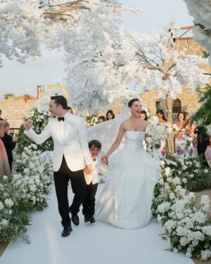 Amy Jackson Instagram - With the sun setting behind us, surrounded by our dearest friends and family, we exchanged our vows in a moment we’ll cherish forever. 
Our dream was to infuse the beauty of our English garden into our special day, and @theblondeflower_ made that vision come alive. The secret garden ceremony you crafted was nothing short of enchanting - it was pure magic.

📷 @corbingurkin