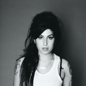 Amy Winehouse Instagram - Beautiful Amy during an iconic photoshoot for Blag Magazine in 2006. 🖤

📸: Sarah J. Edward

#BackToBlack