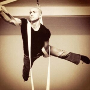 Andy Puddicombe Instagram - #TBT...another lifetime and a degree in circus arts. As students we took whatever gigs came our way...this was me warming up in ‘straps’ for a magazine shoot with Jean Paul Gaultier. The mind is still willing these days, but alas the body has other ideas 😂😂 Have a great wknd!✌️