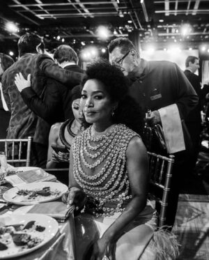 Angela Bassett Instagram - Hey Everybody you good? Let’s get into this #GovernorsAward glam 🤍

Stylist: @jlynnstyle18 
Hair: @hairjunkierandy 
Makeup/📷: @dandremichael 
Dress: @giambattistavalli 
Shoes: @sarahflint_nyc 
Jewelry: @cicada_jewelry @debeersofficial
Trainer: @getfitbyrob