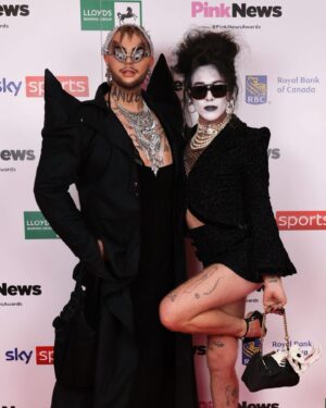 Anubis Finch Instagram - @pinknews 💕💕💕 #PinkNewsAwards thankyou for having me and naming me on your fav looks list!🖤 glasses/nails/armour pieces by me, coat by @malonfashion 💍 got three Halloween looks planned so far but what looks do you guys wanna see me do this spooky season??👀 #ANUBIS #DragRaceUK #PinkNews #CharityKase #DragRace