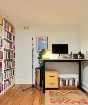 Benjamin Law Instagram - New home office setup has dropped. And if you were one of the PERVERTS* who demanded to see my bookshelves after we moved house, swipe, zoom in, I am ready to be judged. 

*No shade, we are a pervert-positive home
