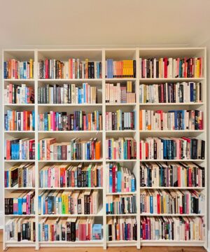 Benjamin Law Instagram - New home office setup has dropped. And if you were one of the PERVERTS* who demanded to see my bookshelves after we moved house, swipe, zoom in, I am ready to be judged. 

*No shade, we are a pervert-positive home
