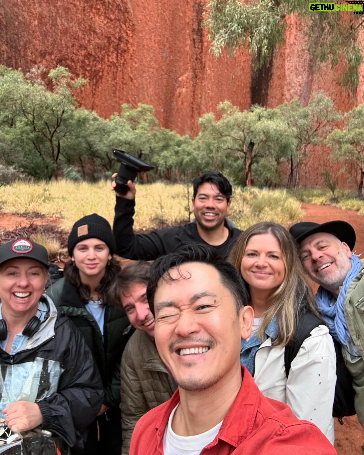 Benjamin Law - 4.6K Likes - 24 HOURS IN ULUṞU
Shot this lil’ segment in beautiful Aṉangu Country after a rare evening of rain. It meant we could see the true black shade of the monolith under its red rust foundation, and how freshwater gathers at the base of the structure – which is taller than the Eiffel Tower, more ancient than the first dinosaurs and runs another 2.5km underneath.
Thanks to Uncle Sammy Wilson – son of Paddy Uluṟu! – for welcoming and handpicking bush tomatoes for us (an unexpectedly perfect mix of tomato and banana), and this dream team crew of the two Dans, Pariss, Bruno, Sarah and Toby.
And, of course, icon Julia Zemiro who can do no wrong and for whom I would walk directly into peak hour traffic with my eyes closed if she asked.
On yr TVs soon. Palya, peeps. ✌🏿✌️✌🏼
