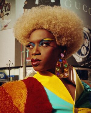 Black Peppa Instagram - “Won’t you take me to Funkytown?”

LFW- LOOK 4- Wearing custom @christopherniari to attend the @frolovheart SHOW. Had this concepts for months where I’d use various fabrics with different textures particularly bathroom rugs, felt, suede, faux leathers and furs to create a groovy tailored high waisted pants suit. For this LFW it was also my priority to showcase more black hair styles and desired to style a blonde Afro myself. This was the first time I’ve styled any wig and was quite proud of the end result I must say.

Photographer: @kimlangstudio 
MUA: @jackoliverx using @theunseenbeauty 
Full look: @christopherniari 
Hair by me
Earrings: @nobasicbombshell
Money Nails by @nailsanthonys