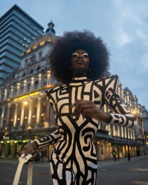 Black Peppa Instagram - London Fashion Week Look 1 - Part 1
LCF POSTGRADUATE SHOW 🦓

📸 @ivantruewizard 
MUA: @jackoliverx 
Catsuit constructed by @itsjust_joe and fully hand painted by moi 
Waist: corset by @misty_couture 
Heels: @hummingbirdheels spray painted and painted by me including handbag bought from a charity shop.

Makeup
@trixiecosmetics Hotline gel liner white on eyelids
Foundation: @kvdbeauty 
Setting powder and spray : @onesize 
@weledauk 
@maccosmeticsuk