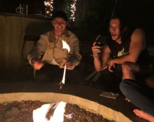 Blair Redford Instagram - Two men giggling over some campfire gossip with red wine and marshmallows.