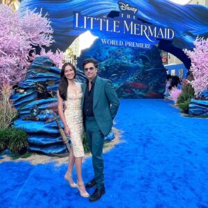 Caitlin McHugh Instagram - I was so excited for tonight and @disneylittlemermaid did not disappoint!! @hallebailey is sensational as Ariel. @melissamccarthy embodied Ursula like only her and Pat Carroll could do.  Scuttle / @awkwafina gets a new song from @lin_manuel and is a new favorite.  I highly recommend you run or swim to your closest theater to see this incredible film.  Thank you @shophelsi for the dress @jywoodward @alevimilano for the heels 🧜🏾‍♀️❤️