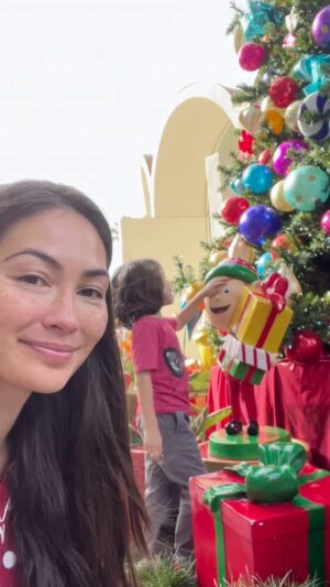 Caitlin McHugh Instagram - At @disneyland Veteran’s Day weekend is the beginning of the Christmas season. Billy and I wanted an early start so we stayed at our favorite off property hotel @hojoanaheim Just a 7 minute walk to the parks, but we couldn’t depart before our mandatory balloon sword fight.  He was also extra stoked about the rubber ducky. 

We stopped at @ihop for a delicious pancake breakfast on the way.  We thoroughly enjoyed the first holiday parade of the season.  What’s your favorite part of the holiday overlay at Disneyland? Mine is NBC on HM and It’s a Small World 😊