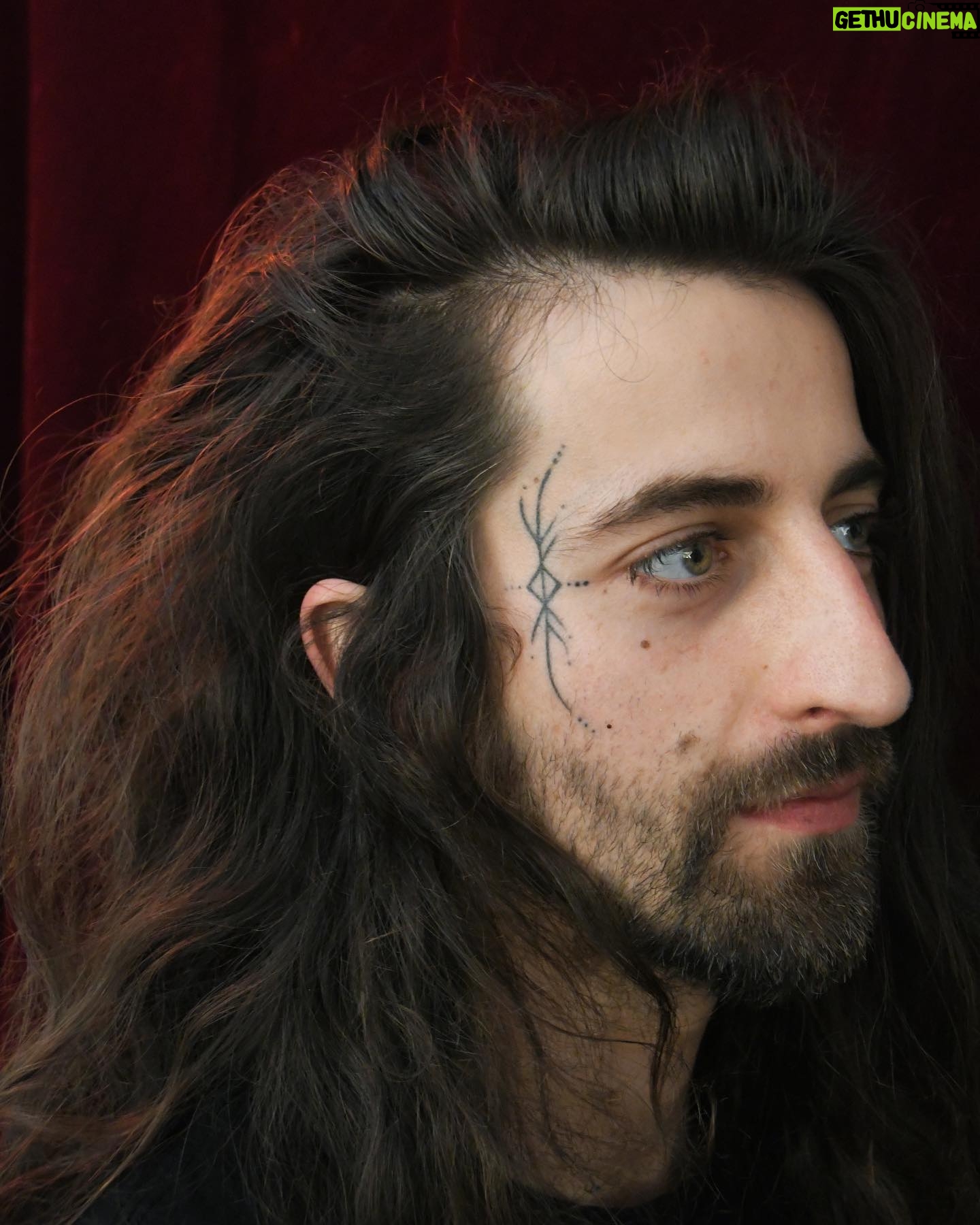 Cameron Cole - 750 Likes - Summer solstice of 2021 I got to mark the face of the legendary @mrcamcole with this little dancing runestave. Took us this long to get & post some good healed photos XD
It is always a special honour to mark a face so thank you Cam for this one and for coming back for more!
Looking forward to our next session and to your new music coming out as well :)
>> go check him out you won’t regret!
And if you want your own personal runestave ink for what you are manifesting, transforming and becoming, I would love to hear from you.
.
.
.
#blackworkerssubmission
#undergroundtattoo
#norsetattoo #tattoosofinstagram #abstracttattoos #abstracttattoosubmission #arrowstattoo #onlythedarkest #blackworktattoo #blackworktattooartist #boyswithtattoos #facetattoos #punktattoos #runestavetattoo #runestaves #runestave