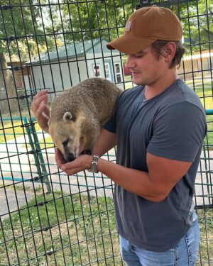 Carson Boatman Instagram - My new buddy, Dom. A #coatimundi from @wildanimalsafarimo