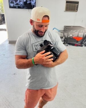 Chad Mendes Instagram - Stopped by to see my boy @hottshotsdetailing new pup and she immediately passed out in my arms lol. Might be time for the Mendes family to get a new pup!