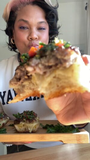 Chef Lovely Instagram - With the Chimichurri Drip 😜#LoveYouLetsEat S/O to @elmagococina for the inspo and @samwillsmusic @kofistone_ &  @jake_milliner for the vibes ✨

Lamb Sandwich 
1 lb ground lamb
1 1/2 tsp dried oregano 
1 1/2 tsp paprika 
1 1/2 tsp ground cumin
1 tsp s&p 
3 cloves of garlic, minced 
2 Tbsp white onion, grated 
Provolone cheese
Sourdough baguette 

Mint Chimichurri 
1/3 c finely chopped mint
2 Tbsp finely chopped parsley
Half of a Fresno chili, minced
1 garlic clove, grated
Big splash of white balsamic vinegar 
1/4 c extra virgin olive oil 
Juice of half a lemon
Zest of 1 lemon
Salt to taste

Directions
Slice the baguette in half length wise then cut each half into 3 pieces,  totaling 6 pieces of bread.

Dig out a little bit of bread from each piece making a small well.

Nestle a couple slices of provolone cheese in each piece of bread. Set bread aside.

In a mixing bowl, add in the lamb, seasonings, garlic and onion. Using your hands, combine ingredients well.

Divide the lamb into 6 equal sized balls. Take a ball of lamb and gently press it into the provolone cover bread matching the shape of the bread with a little of the lamb hanging over the edges. Repeat with the rest of the lamb.

Heat a cast iron skillet over medium high heat and add a good drizzle of olive oil.

Sear the sandwiches in 2 batches, lamb side down until golden brown. About 2-3 min.

Flip the sandwiches and cook for another min.

Place the sandwiches in a 350° oven for 3-5 min. 

For the chimichurri, mix all ingredients well in a bowl. I like to make this first or the night before to give the ingredients time to mingle and bloom 😉 

To serve, garnish the top of each sandwich with a big spoonful of the chimichurri and a salad. Place the bowl of remaining chimichurri on the table bc everyone will be going back for more!

Love you, my loves 😘