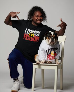 Danzal Baker Instagram - Literacy is so many things. It’s confidence, self-reliance and autonomy. Literacy allows you to take control of your life and stand up for your rights. Literacy is freedom. 
That’s why this National Reconciliation Week, I’m (and @dabakerdog despite the grumpy look on his face 😂) so proud to be joining @alnf_ and @deushouse, working together to empower First Nations communities across Australia. 
All profits from this “Literacy is Freedom” tee support ALNF’s
community-driven and groundbreaking literacy and language programs, transforming lives every day.
We all need to do our part, so stand with me and grab your tee today.
Available exclusively online or at select @davidjonesstore, and in-store at @deushous Camperdown and
@goodwaysdeli.

#BeBraveMakeChange #LiteracyisFreedom #NRW2022