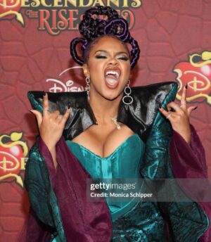 Dara Reneé Instagram - Uliana is HEREEEEE!!!!👻💜💋🐙 I’m so grateful I had the opportunity of designing my own dress with the help of @auntfunkyscloset who guided me every step!! Thank you Queen for helping me bring my villainous ideas TO LIFE!! Big shoutouts to @iamaraxilindsey who helped me create Art with my HAIRRR!!! Fun Fact!! The twists and turns of my hair were inspired by TENTACLES!! And thank you @rebekahaladdin for slayingggg my FACE!! Anddd Thank You to my Family who flew all the way from BALTIMORE TO SUPPORT ME!!! AND THANK YOU TO ALL OF MY MAGICAL FRIENDSSSS!!!Today was truly a special day for more reasons than one💜 For the first time in a long  time I felt beautiful 💞♥️ LOVE YOU ALL!!! And stream DESCENDANTS THE RISE OF REDDDDD!!!!!😆💞💐🔥🔥 #uliana