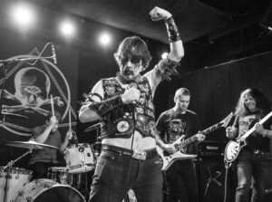 Dave Hill Instagram - Sad to hear about @saintvitusbar closing. I had so many great times there, saw so many great shows, performed comedy shows there, and played there as a member of @walterschreifels band, @valleylodgeband, and @witchtaint. I even hosted one of my best/worst ideas, Speed Metal Dating, there. But what impressed me most about Saint Vitus is the fact that they always had soap, paper towels, and toilet paper in their bathrooms- extremely rare for an indie metal/punk/rock club in my vast experience. Here I am forgetting the words to Black Sabbath with @david.davidson and @alexskolnick on guitar at the @metalinjection 15th anniversary show a little while back. Not sure who took this photo. If you know, let me know.