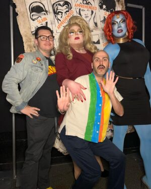 Dax ExclamationPoint Instagram - After finally getting home and sleeping HARD in my own bed, I wanted to thank @homosuperior_pdx again❣️ (especially for this photo backdrop that literally everyone at the event wanted to take home) 

And of course thanks to @ardawigs  for providing my hair, @3dinfinitydc for all my mystique skulls, and @indibeat_cosmetics for their full coverage #facebass foundation. 

I used a combination of their blue, white, and a green color correcting primer I had in my kit to shade match a zentai (so I wouldn’t be forced to do body paint.) 

Anyway thanks for a great night! It’s always a good time with @dmandamartini @sinagrace and @terryblas ❣️❣️❣️❣️ #xmen #homoSuperior #hausDarkholm #mystique #valCooper #drag #portland #comix