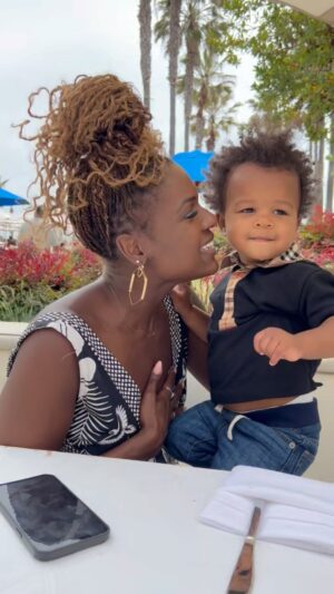 Deborah Joy Winans Instagram - Late Mothers Day Post🤗  The way he was tired of me😂😂 But having been gone for work and getting to squeeze my baby on Mothers Day equaled pure bliss for me💜💜🥳🥳 #Motherhood #MotherhoodIsTheBestHood 🎥 @codieco