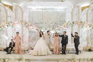 Desy Genoveva Instagram - 🤍🕊️

Wedding Planner & Organizer: @ohana_enterprise
Venue: @hotelciputrajkt 
Decoration: @cattleya_decoration 
Photo & video: @weddingsfactory
Holy matrimony gown: @bychristiebasil @christiebasill 
Bride & groom shoes: @langkahbylinalee @langkahforman
Groom suite: @sasdesigns 
MUA bride: @karenshenna.makeup
Hair do bride: @faw.hairdoo
MUA moms: @ohana.bridal
MUA bridemaids & sister: @neny_mulyani 
Gown moms & bride’s sister: @ohana.bridal
Reception gown: @ohana.bridal 
Bridesmaids dress: @atvezzo
RSVP & Digital Invitation: @viding.co 
Photobooth: @twinsphotobooth 
Wedding cake: @breadseason 
Entertainment: @seisarte.entertainment 
Reception bouquet 💐: @kikukoflorist 
Nails: @samikate.beauty

#KELpincutDESY