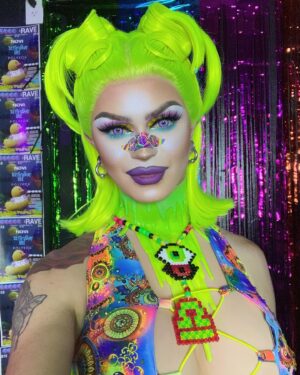 Dollya Black Instagram - Raver babe at the @kandikr4ve 😈 congrats to my friend @bitcrusherboi on a successful show 💚🥰 can’t wait for the next one! 
Kandi Necklace: @prettypixelshop @suecydedrag 
Hair: Me 
Bodysuit: @elfalexandria 
Contacts: @ttd_eye 
Use code “Dollya20” for 20% off