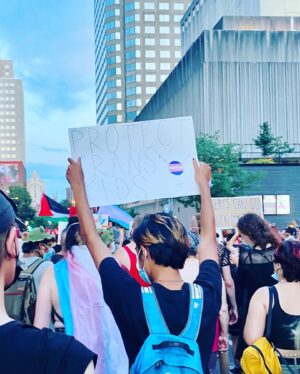 Dominique Provost-Chalkley Instagram - 🏳️‍⚧️ 💚🤍💜🖤💜🤍💛 🏳️‍⚧️

These photos were taken at the Montreal Pride Trans March 2022.
It felt so good to be surrounded by a community rooted in love and authenticity. It also felt deeply important to stand up for all the injustice that trans and non-binary people continue to endure. 

Protect Trans Kids
Protect Trans Love 
We will not be erased. 

Trans and Non-Binary people belong 🏳️‍⚧️🦋#transdayofvisibility