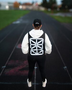 EPROM Instagram - Syntheism Merch Capsule 1 is online now at ⛓️ eprom.design — Yvette is wearing the Syntheism Engineering Vest in medium
